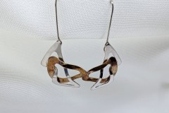 Oorhangers zilver en koper vormen in elkaar